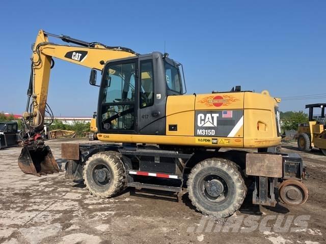 CAT M315D Wielgraafmachines