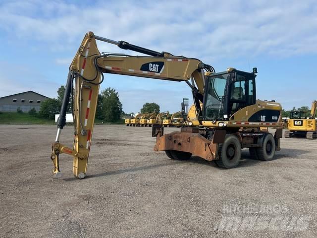 CAT M318D Wielgraafmachines