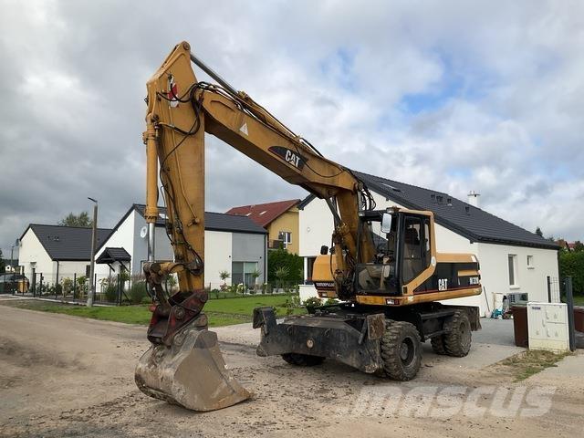 CAT M320 Wielgraafmachines