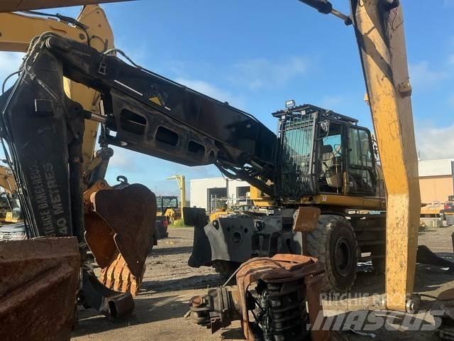 CAT M325CMH Boomstamladers