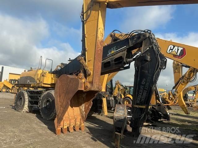 CAT M325CMH Boomstamladers
