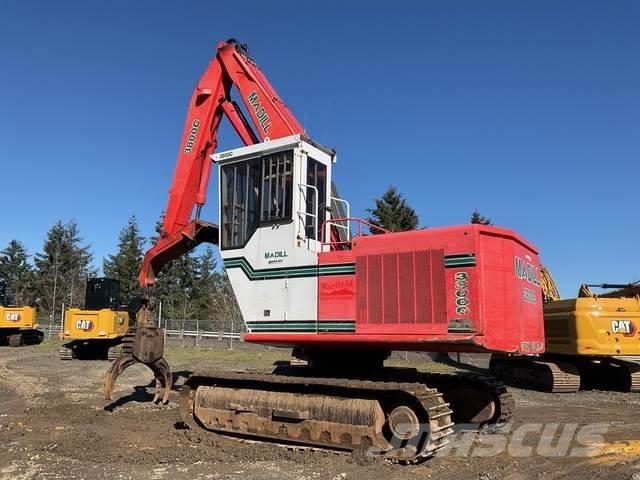 Madill 3800C Boomstamladers