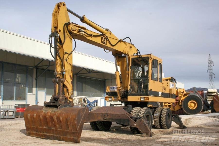CAT 214B Wielgraafmachines
