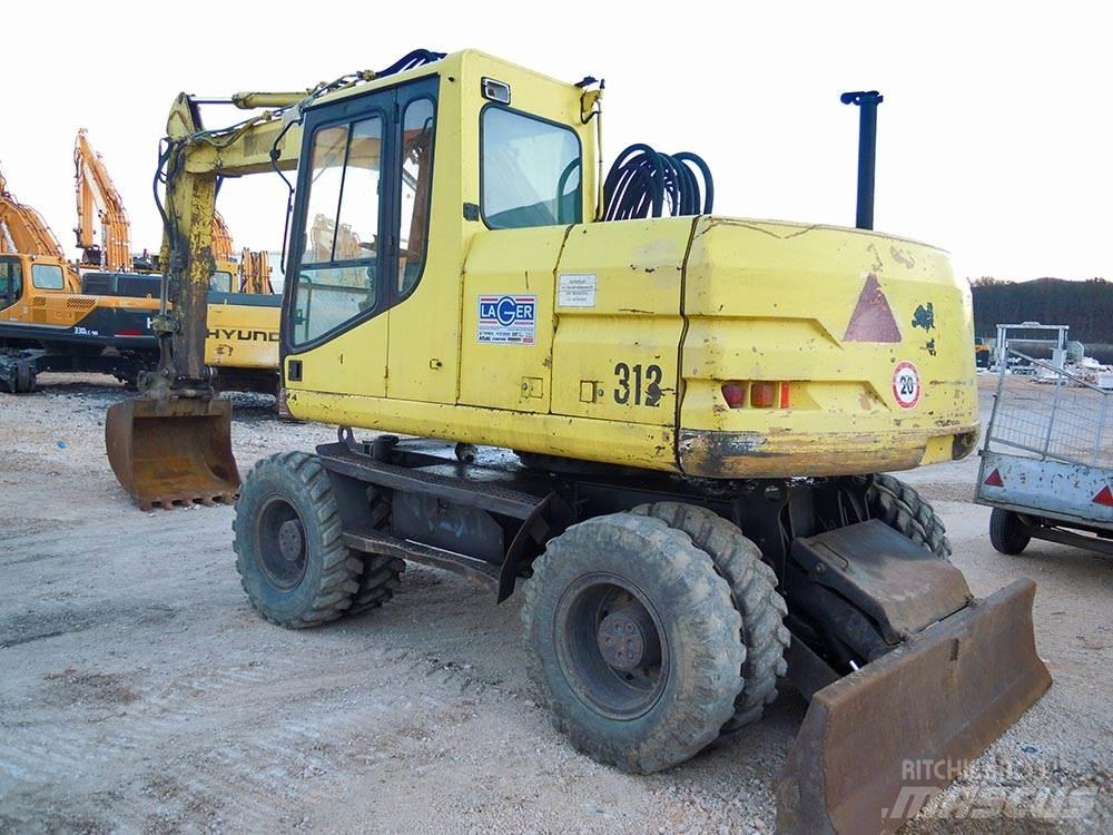 CAT M312 Wielgraafmachines