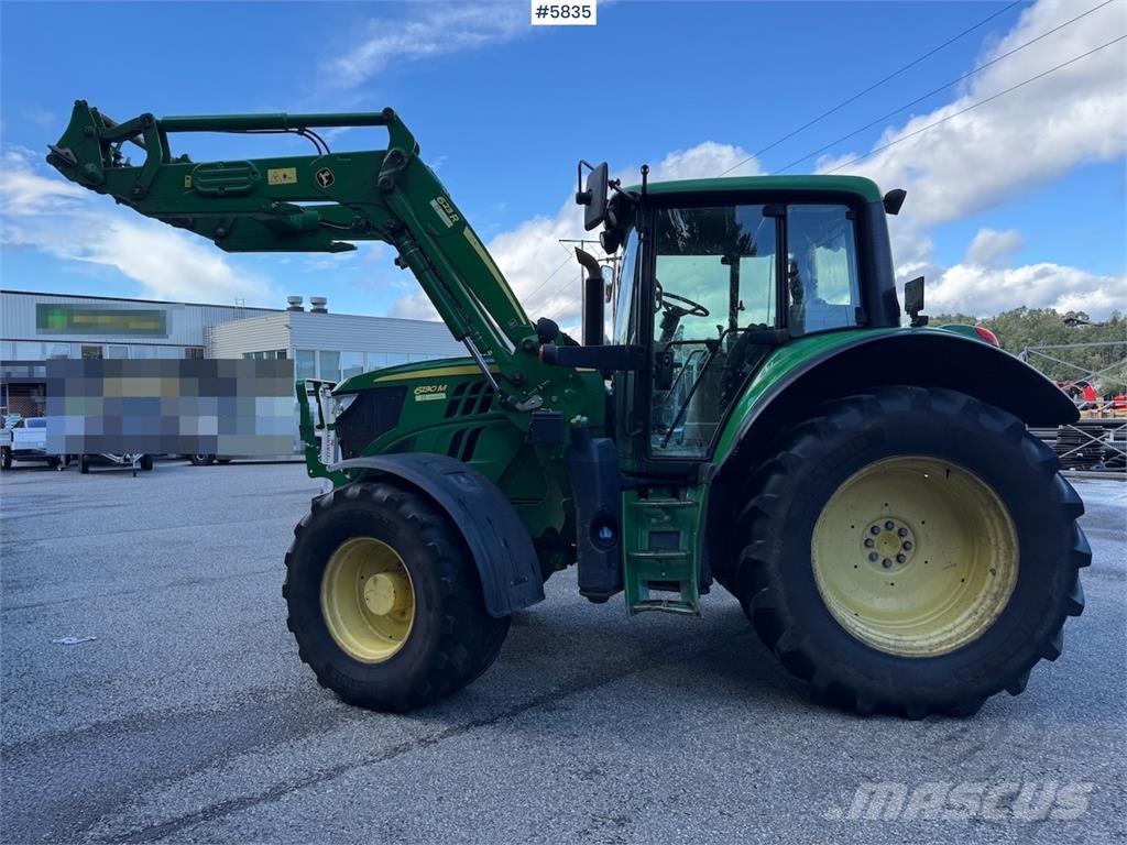 John Deere 6130M Tractoren