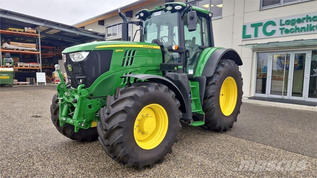 John Deere 6195M Tractoren
