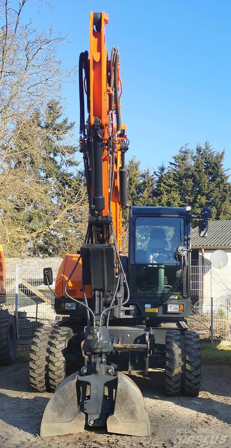 Develon DX 100 W-7 Wielgraafmachines