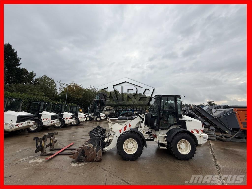 CAT 908M Wielladers