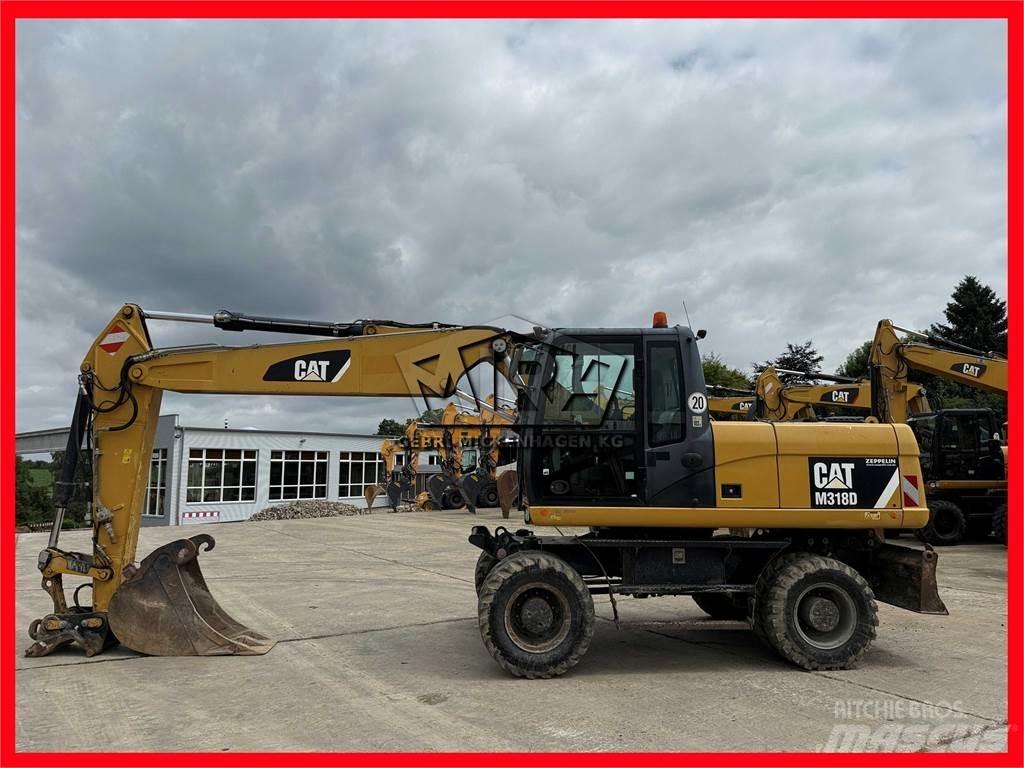 CAT M 318 D Wielgraafmachines