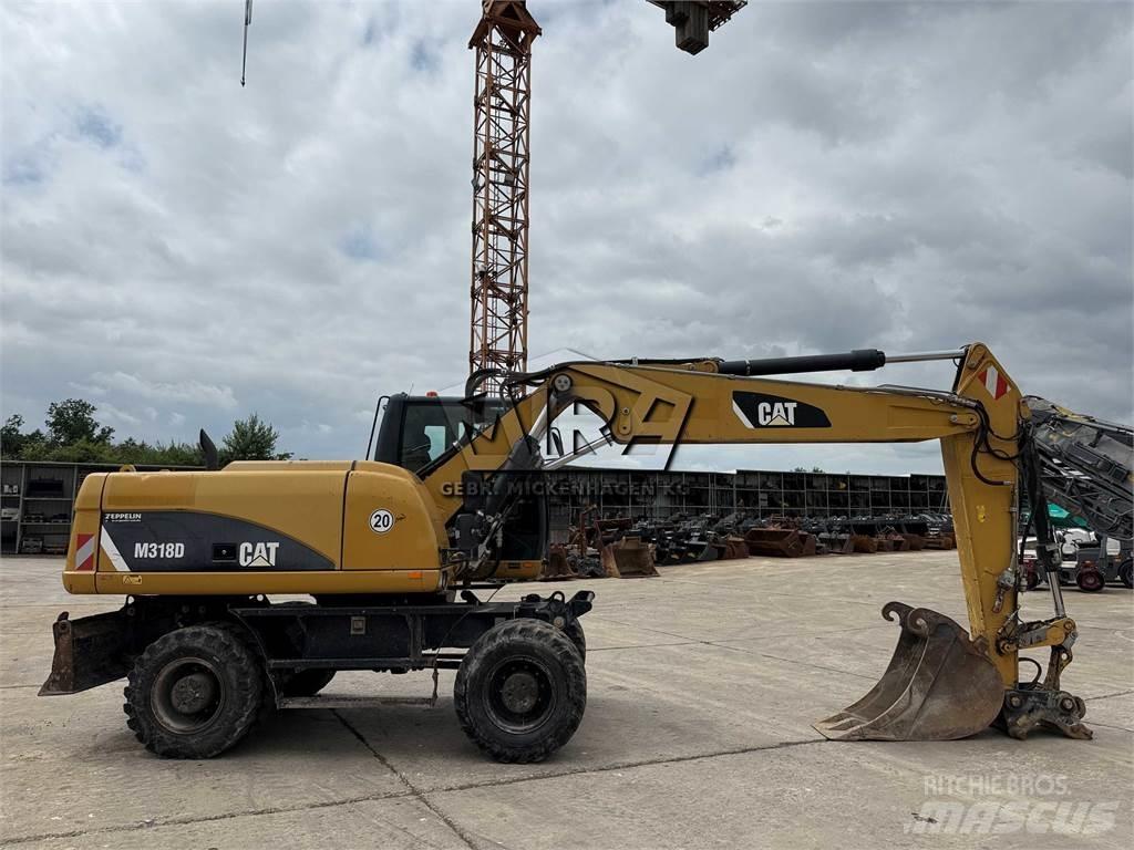 CAT M 318 D Wielgraafmachines