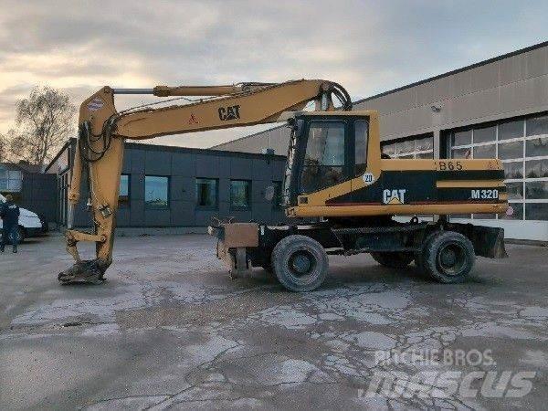 CAT M320 Wielgraafmachines