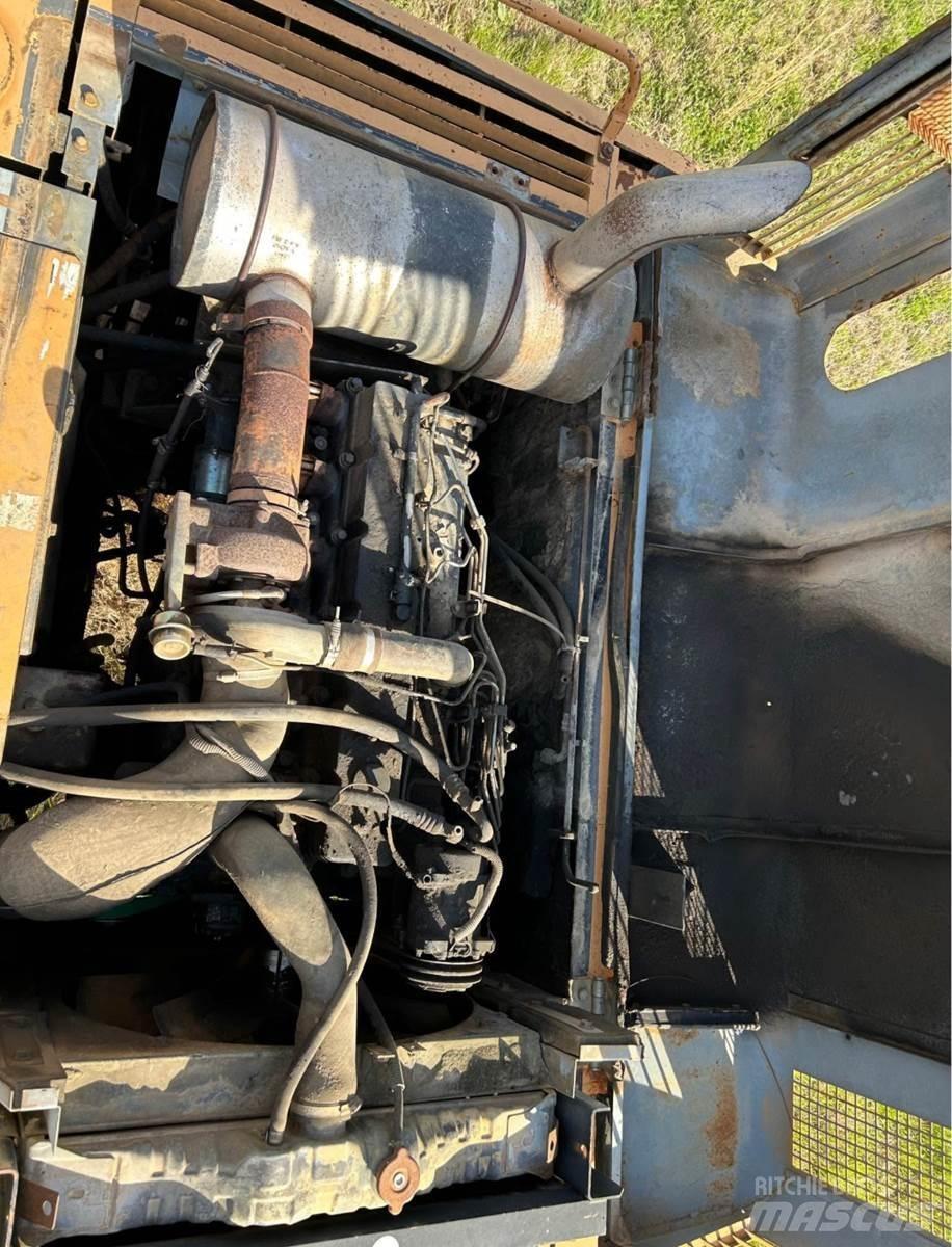 CASE 9040B Rupsgraafmachines