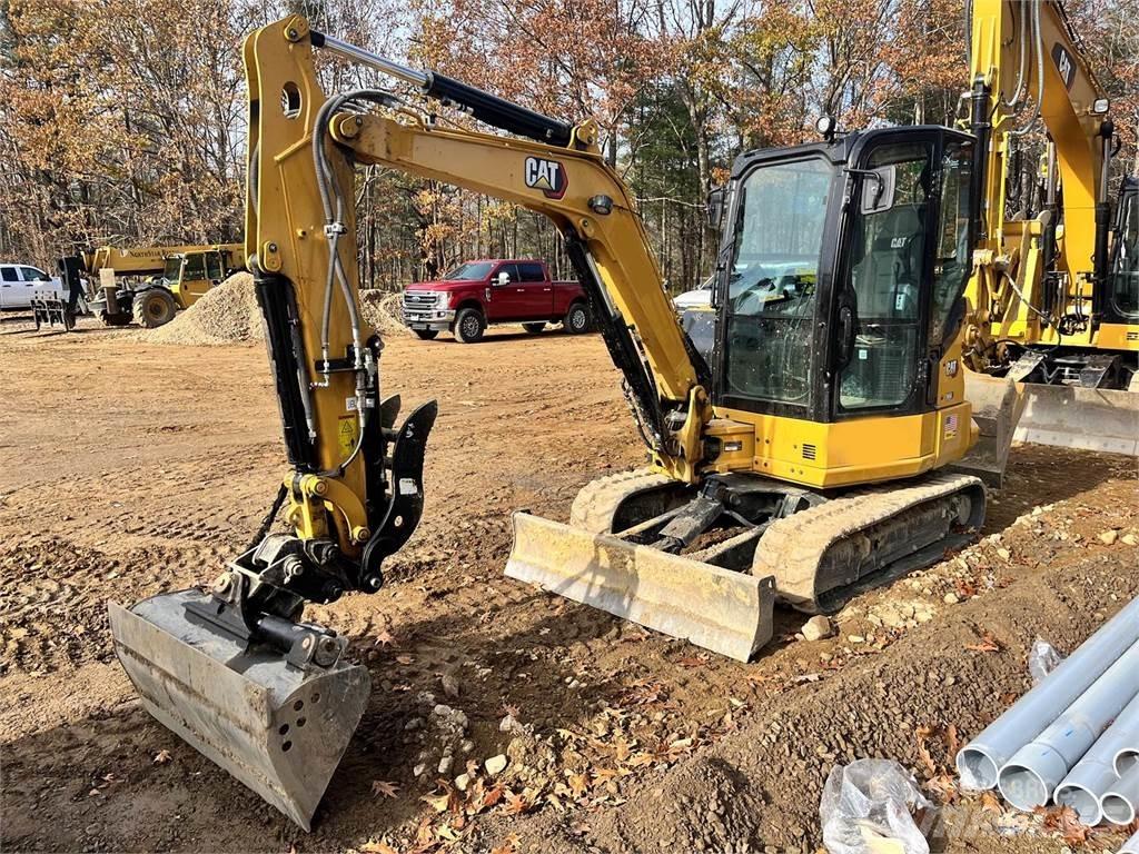 CAT 304 Rupsgraafmachines