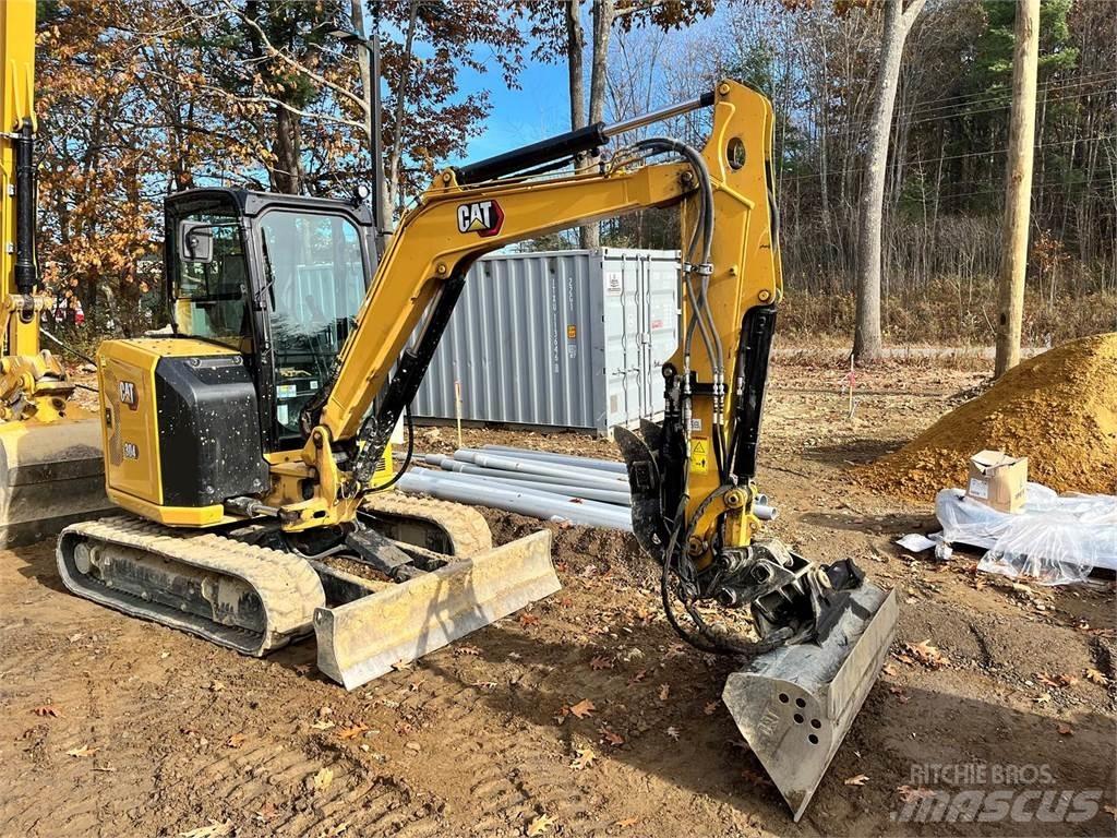 CAT 304 Rupsgraafmachines