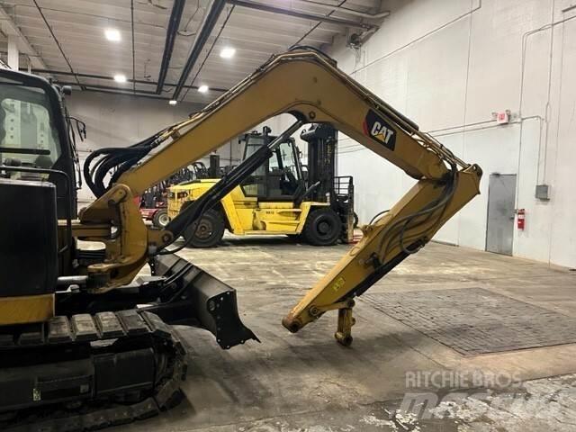 CAT 308 Rupsgraafmachines