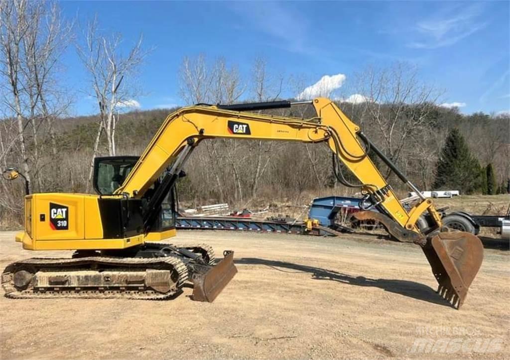 CAT 310 Rupsgraafmachines