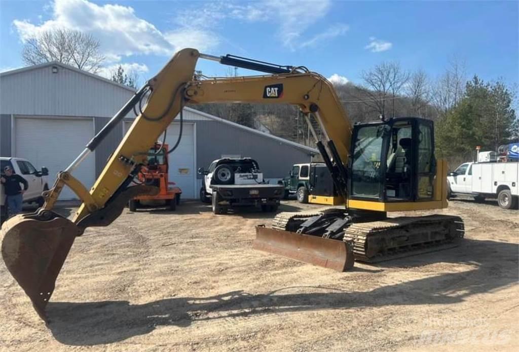 CAT 310 Rupsgraafmachines