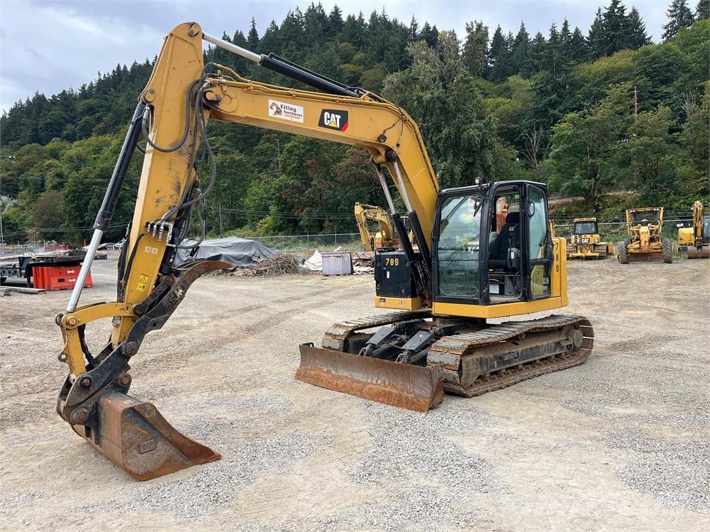 CAT 310 Rupsgraafmachines