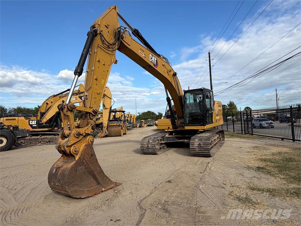 CAT 323 Rupsgraafmachines