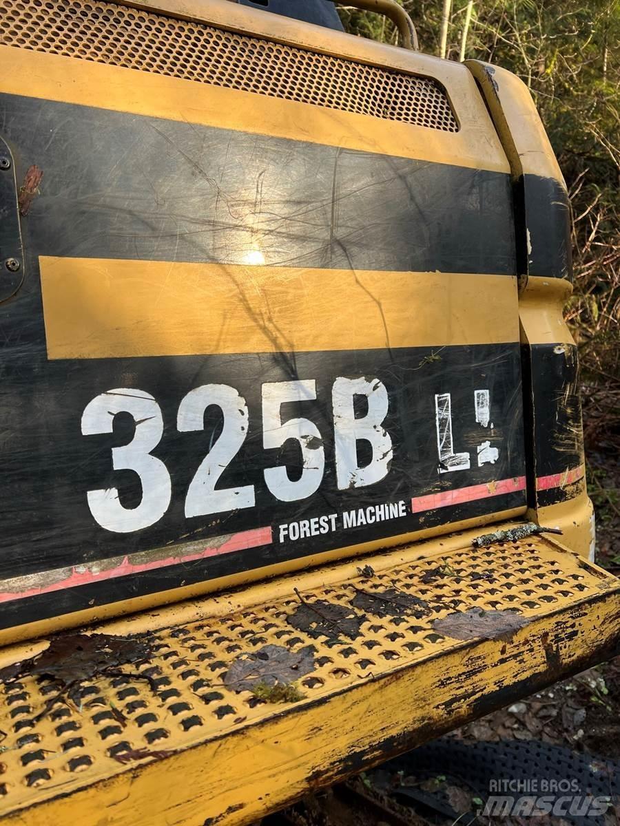 CAT 325BL Boomstamladers