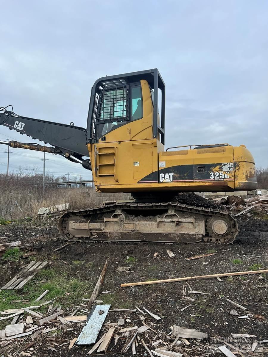 CAT 325C Boomstamladers