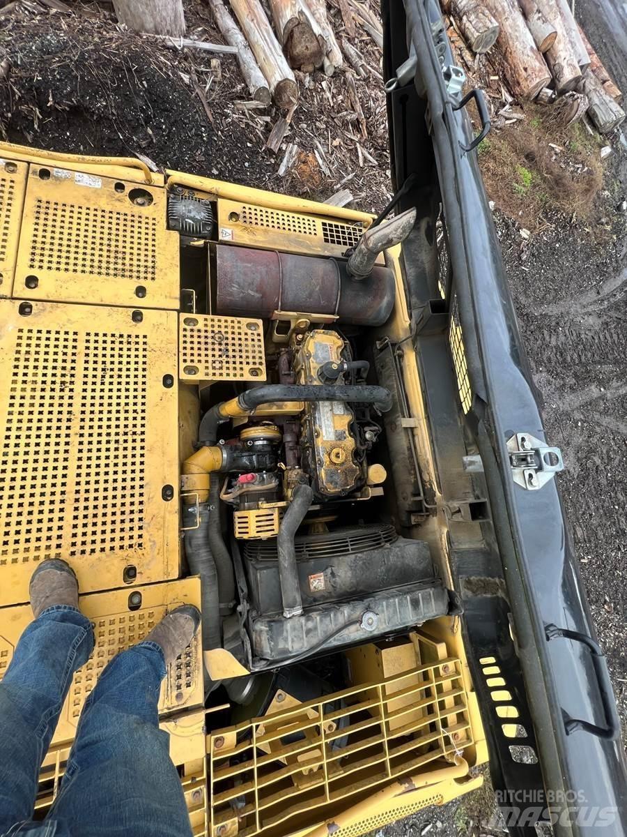 CAT 325C Boomstamladers