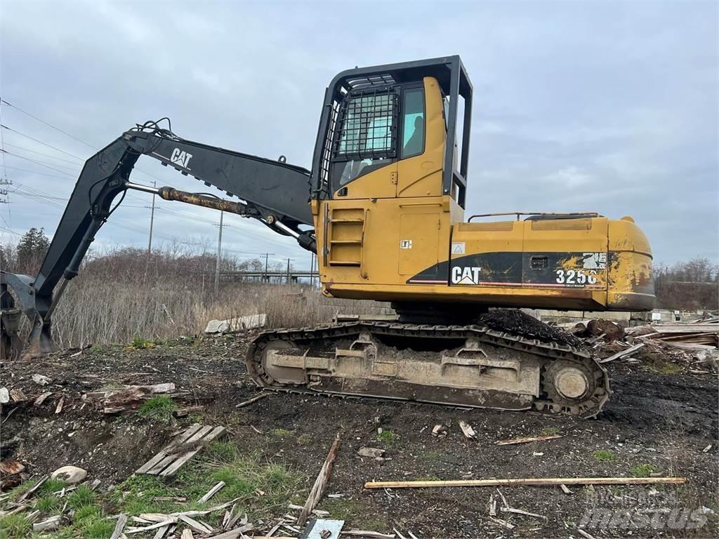CAT 325C Boomstamladers