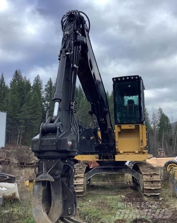 CAT 538 Boomstamladers