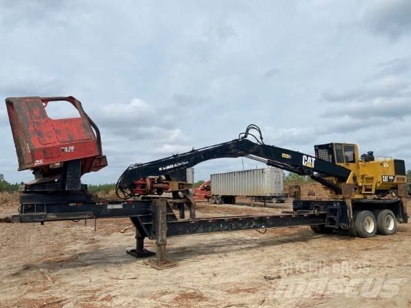 CAT 559B Boomstamladers
