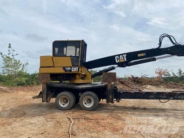 CAT 559B Boomstamladers