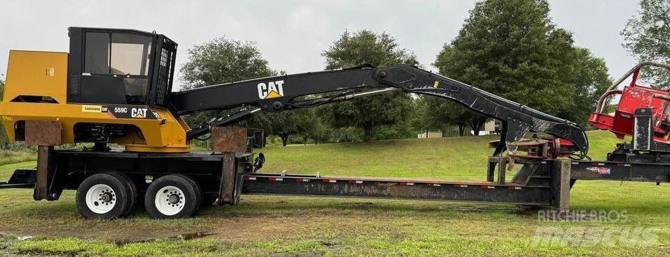 CAT 559C Boomstamladers