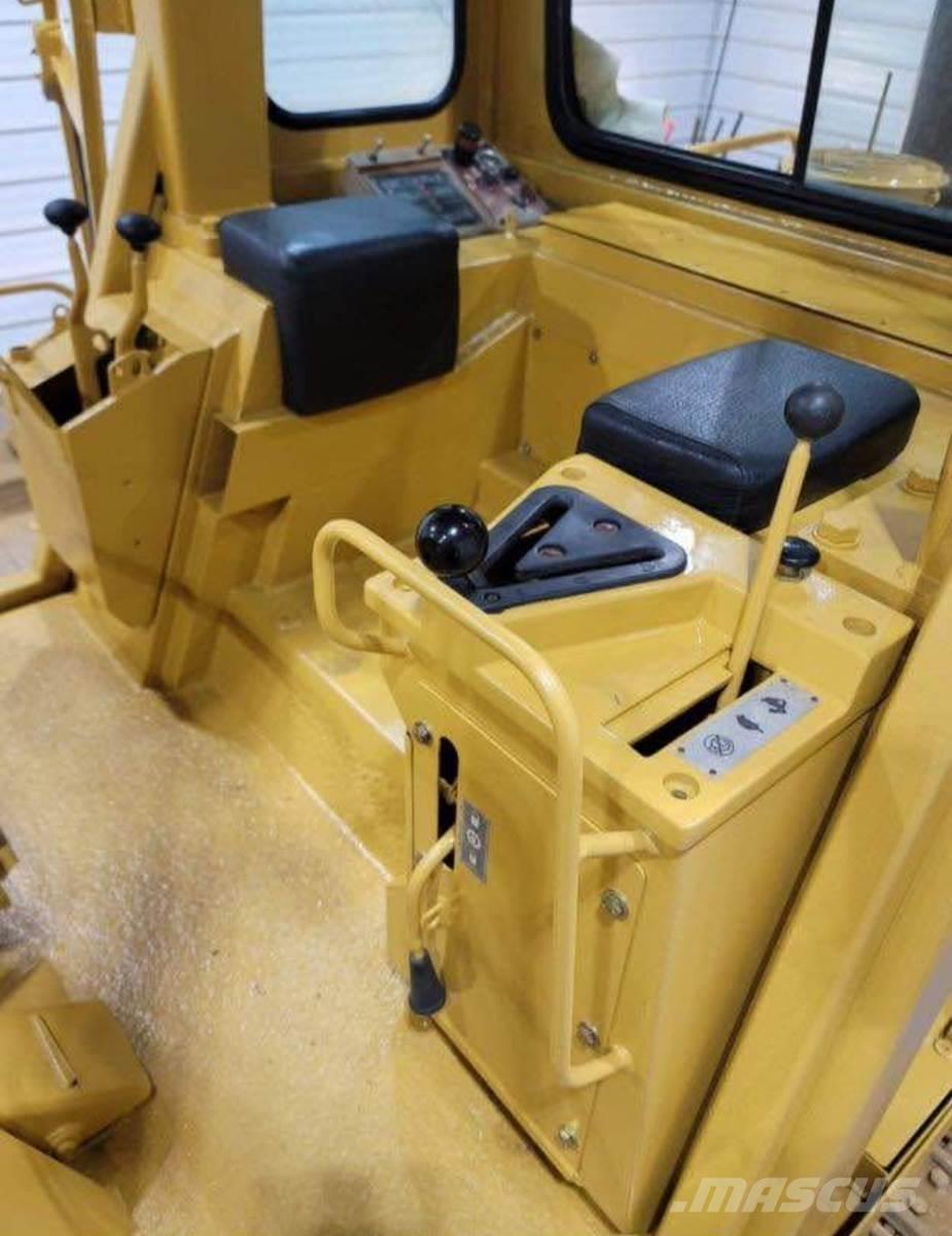 CAT 943 Rupsladers