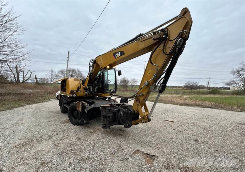 CAT M313D Wielgraafmachines