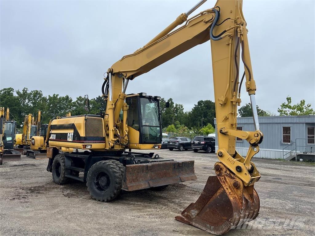 CAT M318 Wielgraafmachines
