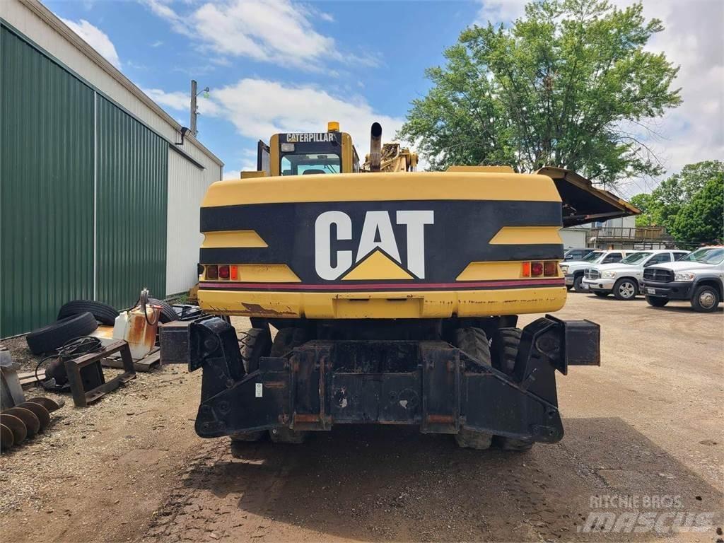 CAT M320 Wielgraafmachines