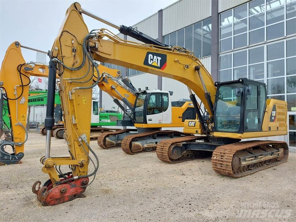 CAT 323 Rupsgraafmachines