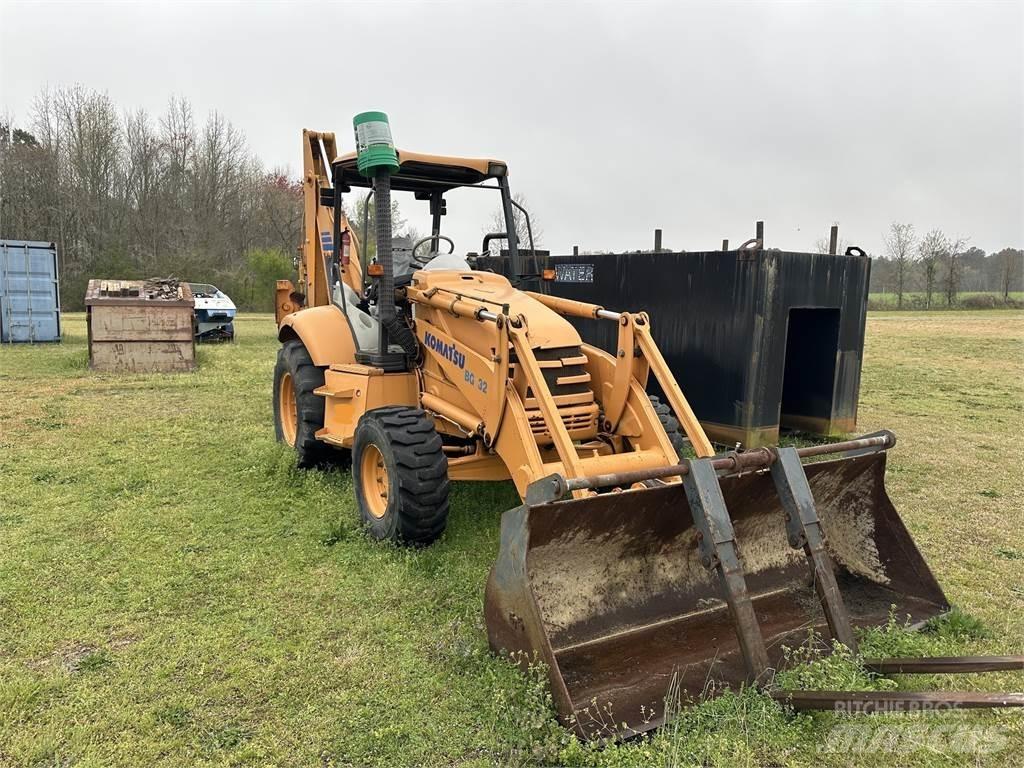 Komatsu WB140 Graaf-laadcombinaties