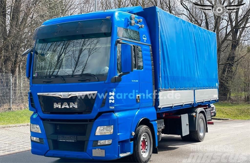MAN TGX 18.480 XXL Vrachtwagen met vlakke laadvloer en lier