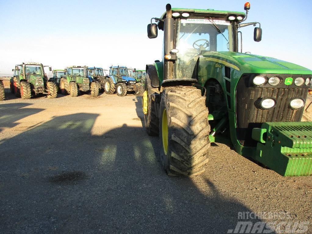 John Deere 8245 R Tractoren