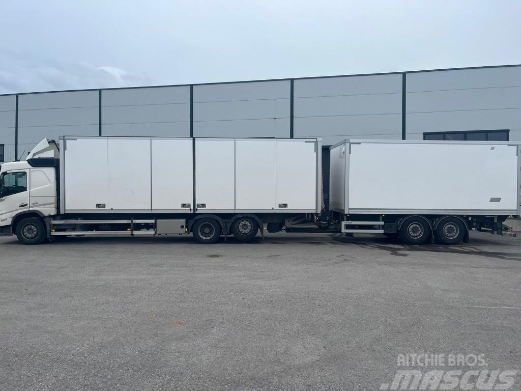 Volvo FM -Truck 21pll + trailer 15pll (36pll) - two truc Bakwagens met gesloten opbouw