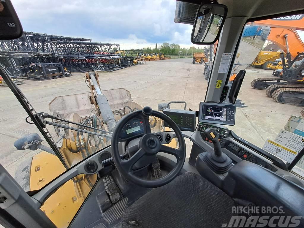 CAT 938M (with round steer) Wielladers