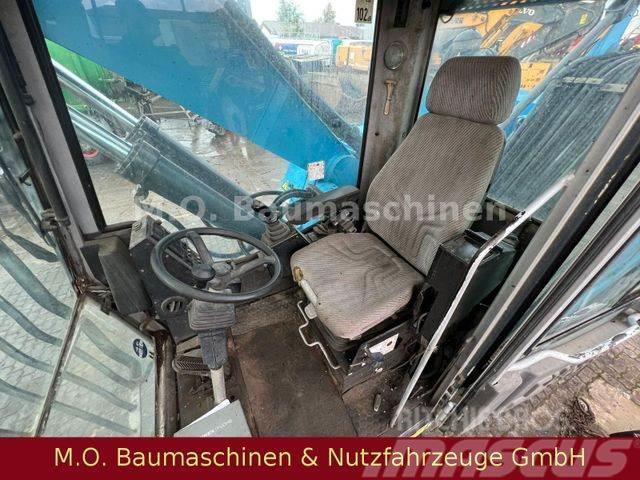 Fuchs MHL 331 / ZSA / AC / Hochfahrbare Kabine / Wielgraafmachines